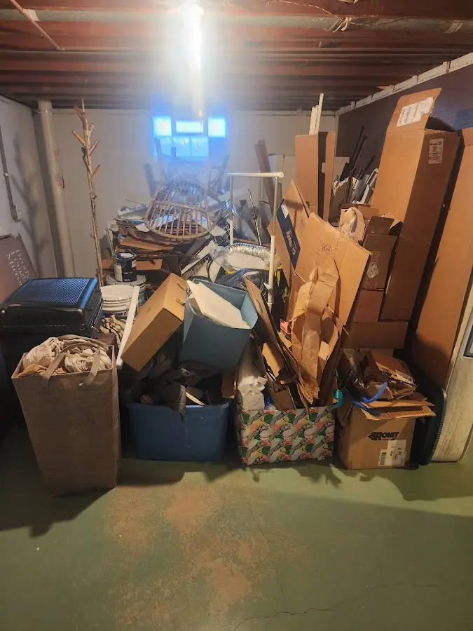 Roll-off dumpster container at job site for 15 Yard Dumpster Rental in Bell